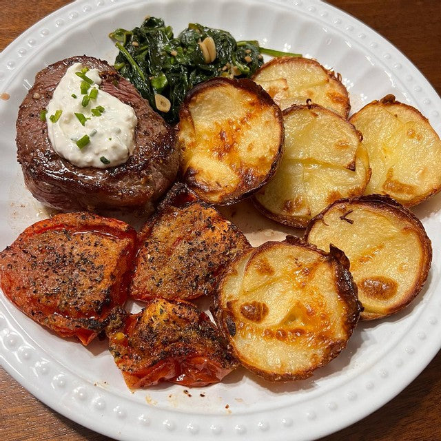 Steak and Horseradish-Herb Cream with Potatoes Pressé and Wilted Spinach