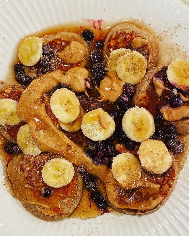 Blueberry Banana Cinnamon Roll Pancakes with Almond Butter